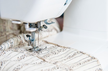 Sewing machine with fabric
