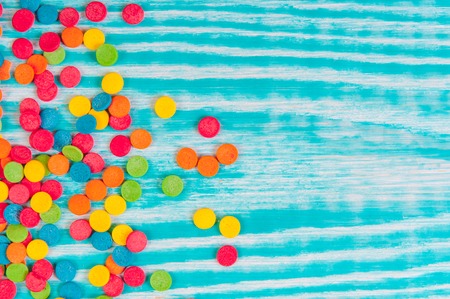 Sugar sprinkle dots, colored decoration for cake and bekery, a lot of sprinkles as a backgroundの写真素材