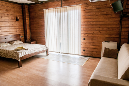 Comfort bedroom in luxury style. Scandinavian style stone and natural wood.の写真素材