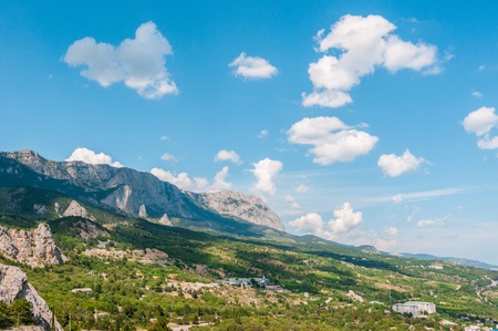 Beach at the seaside, turquoise blue water, view from above from the mountains to the town of Simeiz, Yalta, Crimeaの写真素材