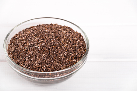 Chia seeds. Chia word made from chia seeds. Selective focus.の写真素材