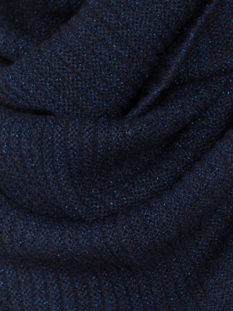 Knitted fabric dark wool cozy textureの写真素材