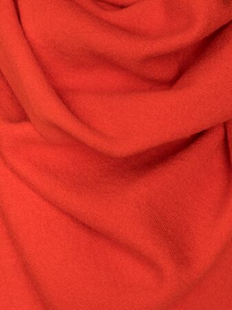 Knitted fabric red wool cozy textureの写真素材