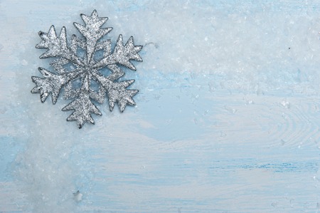 Winter background with snowflakesの写真素材