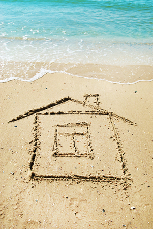 House painted on sandの写真素材