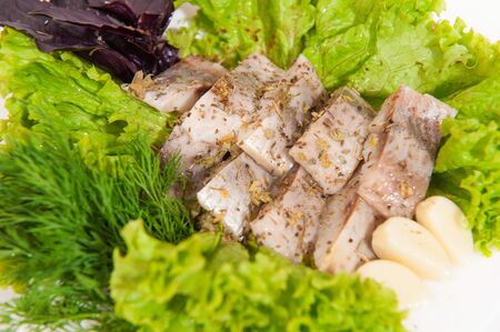 Salted herring with onions and herbsの写真素材