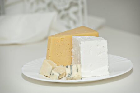 Different types of cheese on a plate