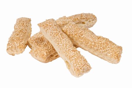 Baking puff pastry cookies on a white background