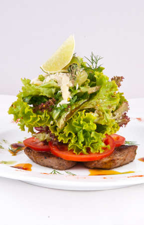 Veal with decor on a plateの写真素材