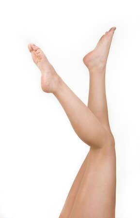 Female feet on a white backgroundの写真素材