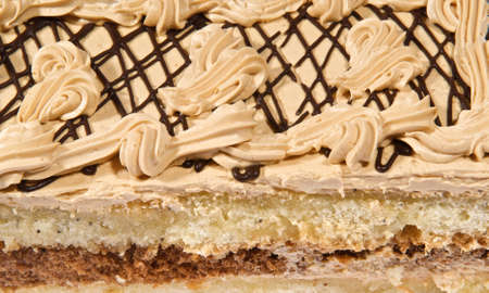 Cake with sweet cream decorations