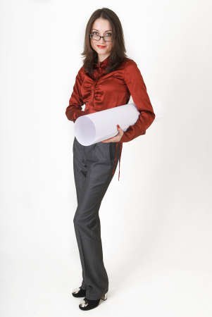 Young business woman in business clothes with a roll of paper