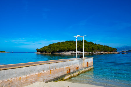 White sand beaches and blue water in Ksamil in Albaniaの写真素材