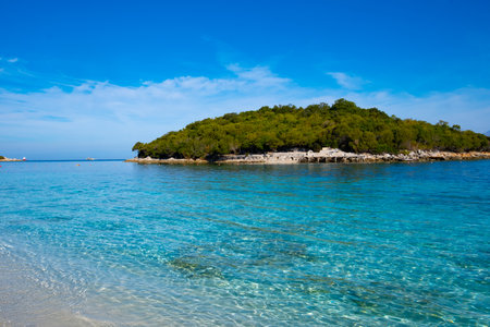 Island in the sea near the coast of Ksamil in Albaniaの写真素材