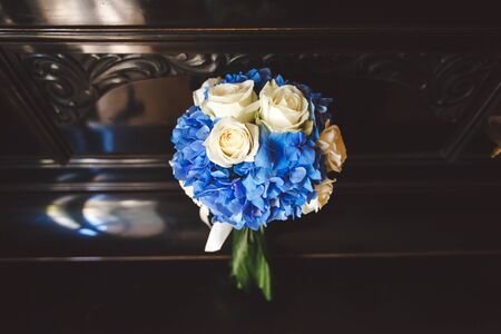 Beautiful wedding colorful bouquet for bride. Beauty of colored flowers. Close-up bunch of florets. Bridal accessories. Female decoration for girl. Details for marriage and for married couple.の写真素材