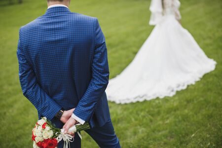 First meeting of bride and groom. Wedding. Emotions groom at the first meeting with beautiful bride....