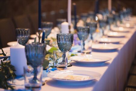 A long table with serving at a wedding Banquet.の写真素材