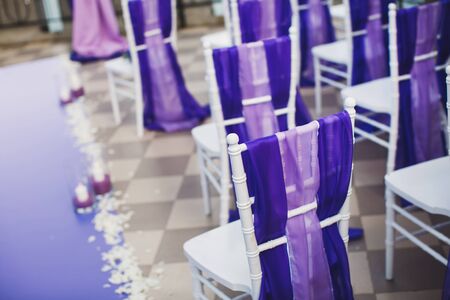 Wedding arch of purple color on the background of the sea.の写真素材