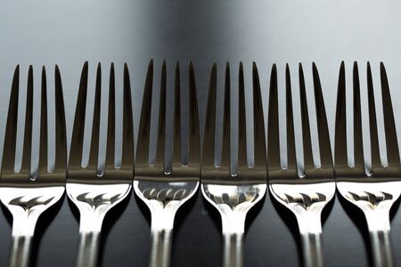 Cutlery on a black background. Fork, spoon, knife.の写真素材