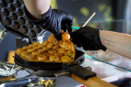 Machine made bubble waffle at shop, Hong Kong bubble waffle.の写真素材