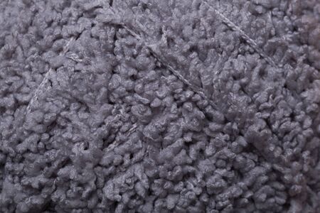 Threads densely reeled up on the coilの写真素材