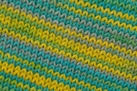 knitted fabric background texture is green. Ornament.の写真素材