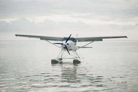 The seaplane is on the surface of the water. Mauritiusの写真素材