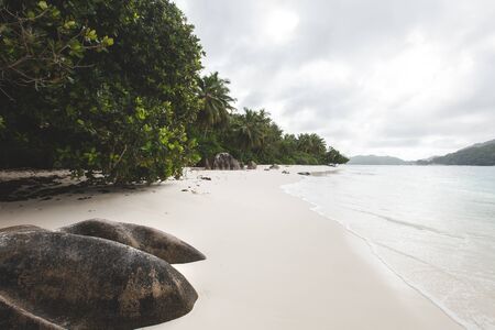 Tropical beach in Seychelles Islands. Snow-white sand on the ocean shoreの写真素材
