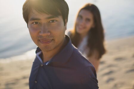 bride and groom walking on the beach of Mauritius.の写真素材