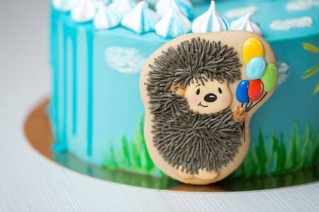 Closeup of gingerbread with a picture of a hedgehog in a baby cakeの写真素材