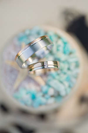 Wedding rings in a decorative jewelry boxの写真素材