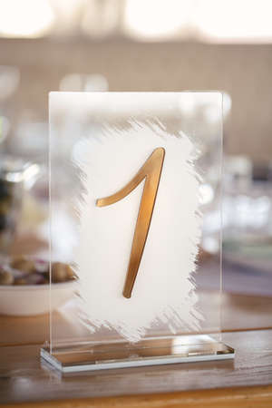 Guest table number. Wedding table in the restaurantの写真素材