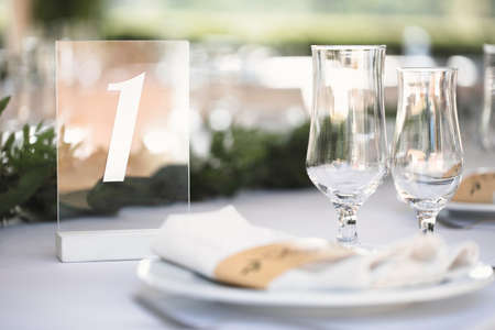 Guest table number. Wedding table in the restaurantの写真素材
