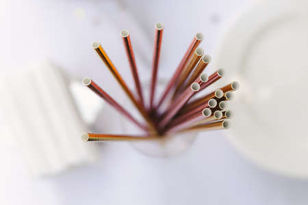Colorful shiny straws for cocktails on the buffet tableの写真素材