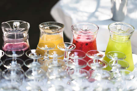 Set of blank empty wine glasses displayed in rows. Preparation for the holiday.の写真素材