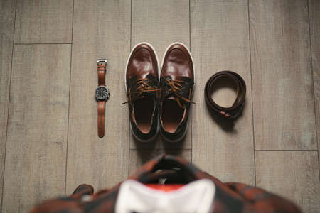 Stylish mens plaid suit and brown shoes, watch and grooms belt.の写真素材