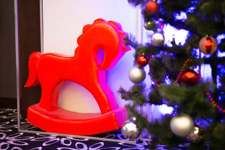 New Years decor in interior decoration. The Red Horse.の写真素材