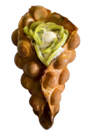 Hong Kong style egg waffle with kiwi.の写真素材