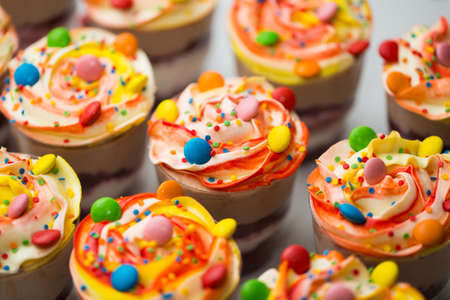 Chocolate and mousse trifle dessert in plastic cupsの写真素材