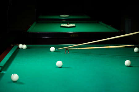 Billiard balls in a green pool table.の写真素材
