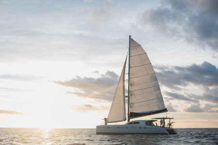 Wedding couple is hugging on a yacht. Beauty bride with groom