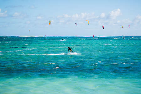 Kitesurfers on the Le Morne beach in Mauritius.の写真素材