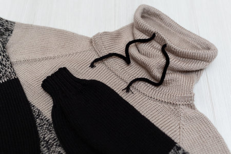 Knitted childrens sweater on a white background.
