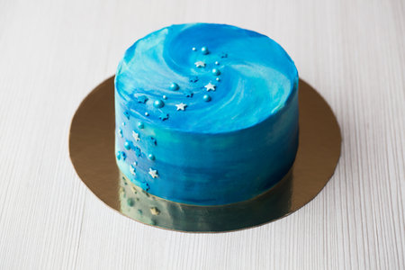 Blue cake with stars. Cake space.