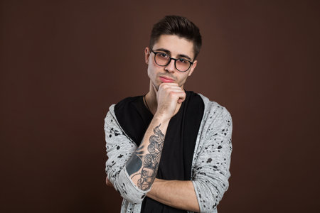 emotions, boredom, laziness and people concept - bored middle aged man over brown background.の写真素材