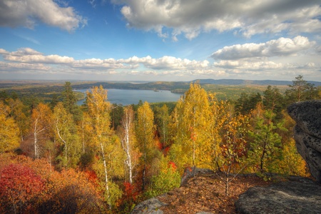 autumn landscape with mountains and lakeの写真素材