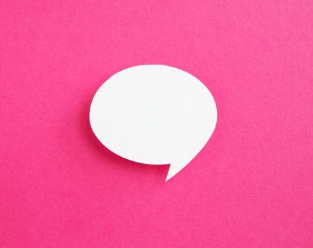 paper speech bubble on pink 