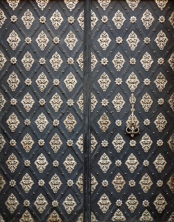 texture of the iron pattern on the old gateの写真素材