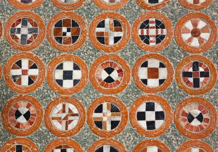 texture of the geometric tracery on the antique floor