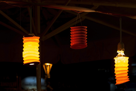Three lanterns on the fun fair outdoor photographyの写真素材